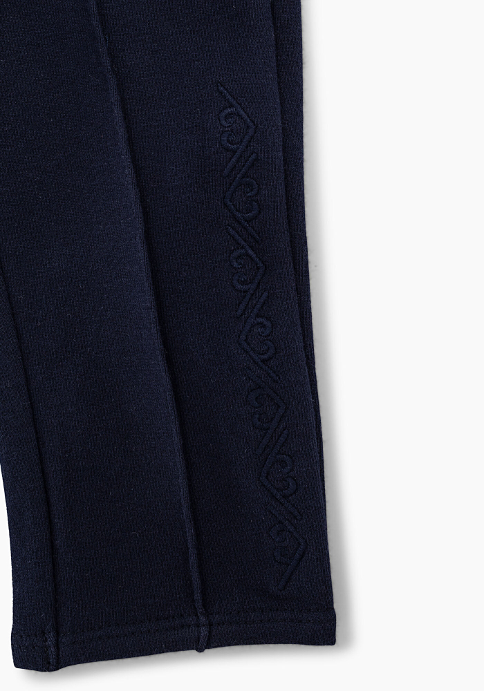 detail dětské dívčí vyšívané pletené kalhoty s volánkem IKKS